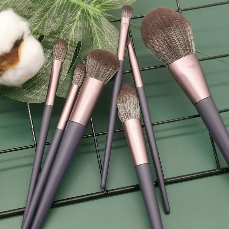 How do you use a powder puff brush for setting powder? 