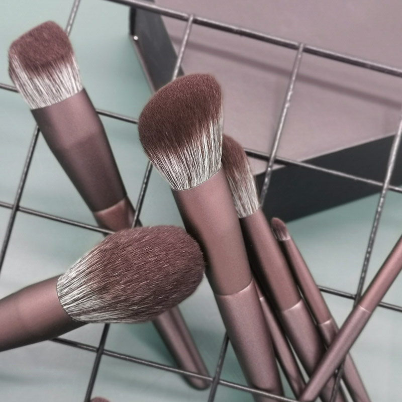 Is it better to apply blush with a brush or a sponge? 